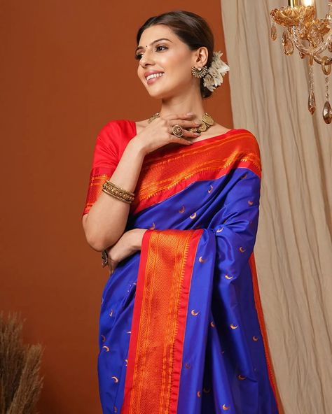 Embrace the essence of Marathi culture with our Royal Blue & Red Soft Silk Chandrakor Paithani Saree. 🌺✨ Featuring intricate checks and copper zari Chandrakor motifs, this exquisite saree captures the grace and heritage of traditional Paithani weaving. The rich peacock designs on the pallu add a timeless allure, making it a perfect choice for weddings, parties, and festive occasions. Celebrate every moment in the elegance of authentic artistry and craftsmanship. #PaithaniSaree #MarathiTrad... Chandrakor Paithani Blouse Design, Blue Paithani Silk Saree, Festive Blue Paithani Silk Saree, Paithani Saree Traditional Look, Saree Traditional Look, Blue Paithani Silk Pre-draped Saree For Puja, Chandrakor Paithani, Luxury Fitted Paithani Silk Saree, Luxury Blue Pre-draped Paithani Silk Saree