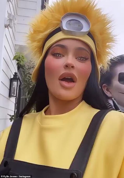 Kylie Jenner and Stormi are matching Minions as Kim Kardashian twins with North on Halloween | Daily Mail Online Kylie Jenner And Stormi, Minions Costume, Beyoncé Wallpaper, Minion Costume, Yellow Minion, Minion Costumes, Minion Movie, Kylie Dress, Yellow Costume