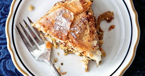 Traditionally pigeon is used to make this slightly sweet, savory Moroccan pie, but chicken thighs, quail, or Cornish game hens make excellent substitutes. Pigeon Pie, Phyllo Dough Recipes, Phyllo Recipes, Saffron Recipes, Savory Pies Recipes, Braised Lamb Shanks, Almond Chicken, Braised Lamb, Ras El Hanout