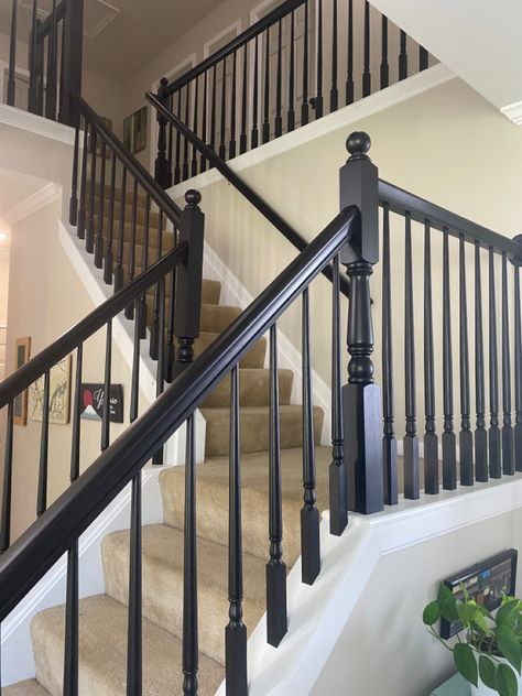 I used Varathane Poly + Stain to transform my staircase Banister Spindles Ideas, Painting Stair Railings, Stairway Update, Orange Staircase, Black Painted Stairs, Painted Stair Railings, Black Stair Railing, Stair Railing Makeover, Loft Railing