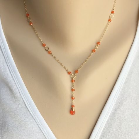 This Lariat & Y Necklaces item by danielaalberts has 418 favorites from Etsy shoppers. Ships from United States. Listed on 07 Jun, 2024 Autumn Necklace Fall Jewelry, Gemstone Lariat Necklace, Top Bun, Gold Lariat Necklace, Necklace Orange, Autumn Necklace, Orange Necklace, Carnelian Necklace, Necklace Layered