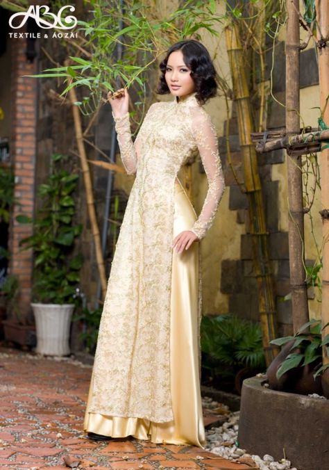 I like this tone of gold. White And Gold Ao Dai, Gold Ao Dai, Bridesmaid Ao Dai, Tea Ceremony Wedding, Country Theme Wedding, Gold Bridesmaids, Qipao Dress, Ceremony Wedding, Short Lace Dress