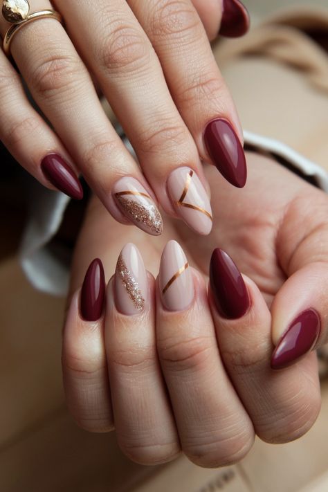 Dive into the essence of autumn with these stunning acrylic fall nail ideas that capture the warmth of the season! Imagine a rich burgundy base adorned with delicate gold leaf accents, perfectly encapsulating the cozy feel of fall. These nails not only elevate your style but also let you express your love for this vibrant time of year. Get inspired and transform your nails for the season! Fall Nails Gold Accent, Burgundy Fall Nails Designs, Fall Bridesmaid Nails, Maroon Chrome Nails, Burgundy Nails Acrylic, Burgendy Nails, Maroon Nail Designs, Uñas Ideas, Bridesmaids Nails