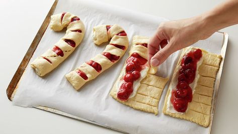 Cresent Roll Candy Cane Dessert, Candy Cane Shaped Danish, Candy Cane Crossiant, Candy Cane Shaped Pastry, Crescent Roll Candy Cane Danish, Candy Cane Puff Pastry, Candy Cane Crescent Roll Pastry, Crescent Roll Candy Cane, Recipes Using Pillsbury Crescent Rolls