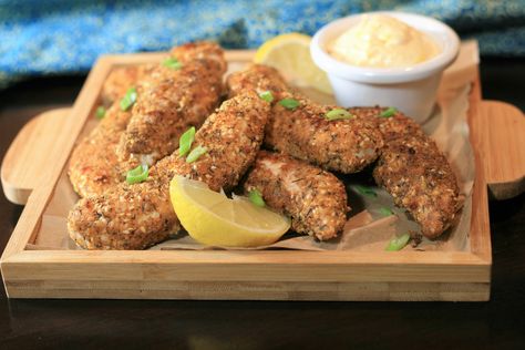 Dukkah-Crusted Chicken Tenders with Lemon-Saffron Aioli Lemon Recipes Dinner, Homemade Chicken Tenders, Crusted Chicken Tenders, Baked Pesto Chicken, Aioli Recipe, Sweet N Sour Chicken, Chicken Tender Recipes, Turkey Dishes, Crusted Chicken