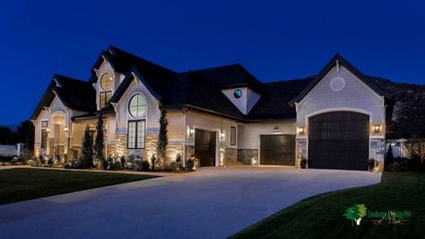 Recessed soffit lights: Why up lighting is the better alternative | Landscape Lighting Pro Soffit Lighting Exterior, Tutor Style Homes, Soffit Lighting, Front Yard Lighting, Exterior House Lights, House Lighting Outdoor, Luxury Landscape, Lighting Exterior, Outdoor Security Lighting