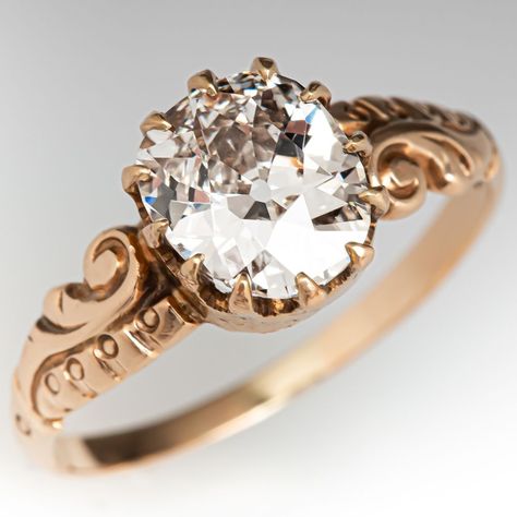 This captivating late-Victorian ring contains one (1) old mine cut diamond weighing 1.22 carats and set into a twelve-prong head. Engraved details accent the shoulders of the ring. The ring measures 8.6mm at the top, rises 3.7mm above the finger, tapering to 1.4mm wide and 0.6mm thick at the base of the shank. This ring is currently a size 6.25. We left the ring unpolished with a lovely natural patina. Late Victorian Engagement Ring, Victorian Wedding Ring Antique Jewelry, Antique Rings Victorian, Victorian Engagement Rings, Victorian Ring, Old Mine Cut Diamond, Victorian Rings, Emerald Jewelry, Antique Rings