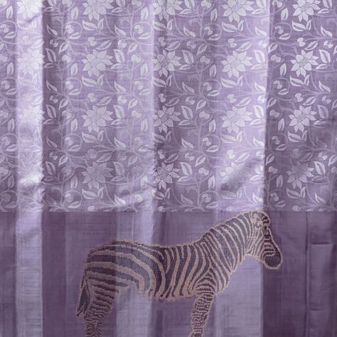 Zebra in Lilac Floral Fields Kanjeevaram 💜🦓 with Pure Gold Zari- This pure silk saree is adorned with delicate light lilac weft work across the body and striking Zebra motifs on the border , creating a captivating fusion of modern design and traditional craftsmanship. Perfect for those who love to make a bold yet elegant statement 💫 #akirasilkweaves #akirasilk #wear1share1withakira #silksareeonline #puresilksaree #silksarees #silksarees #handcrafted #silksareelove #kanjivaramsaree #purplesar... Light Lilac, On The Border, Pure Silk Saree, Kanjivaram Sarees, Silk Sarees Online, Pure Silk Sarees, Pure Gold, Pure Silk, Silk Saree