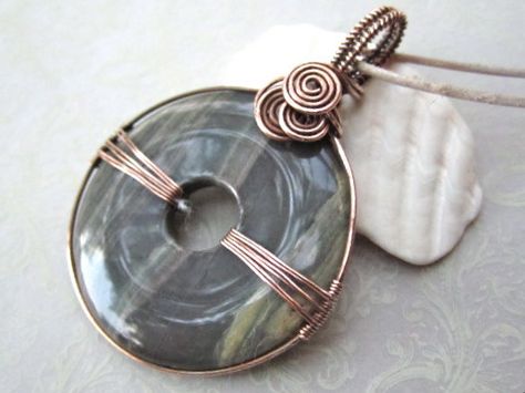 Silver+Leaf+Jasper+Copper+Wrapped+Donut+Pendant+by+MyWiredHeart,+$36.00 Copper Wire Jewelry With Natural Stones In Round Pendant, Wire Wrap Circle Stone, Wire Wrapped Round Pendant Amulet Jewelry, Wire Wrapped Round Pendant Amulet Necklace, Bohemian Wire-wrapped Round Pendant Necklace, Donut Jewelry, Beach Stones Jewelry, Wire Wrapping Diy, Wire Wrapping Stones