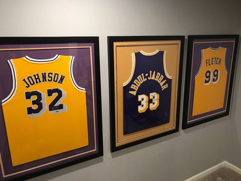 #MagicJohnson #KareemAbdulJabbar #Fletch #Magic #Kareem #Lakers #LALakers #LosAngeles #NBA #framedjersey #jerseyframing Lakers Room Ideas, Lakers Bedroom Ideas, Basketball Gaming Room, Framed Basketball Jersey, Lakers Bedroom, Frame Jersey Ideas, Sport Room, Ideas Cartas, Basketball Bedroom