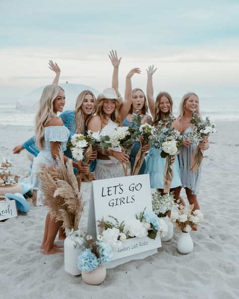 Celebrating love and friendship at a coastal cowgirl bridal shower! A perfect day on the beach with a picnic, champagne, and unforgettable memories. 🩵🌊🍾 Picnic & Planning - @a.picnic.affair Flower Bar - @a.picnic.affair Florals - @laurenciaccia Signage - @forsythlettering Balloon Garland - @littleconfetticompany.fl Airbrush Tans - @honeydippedfl Champagne Kart- @luxepartykarts Charcuterie - @cheeseboards321 Acrylic Accents- @woodwitandwhimsy Cupcakes- @amicisitalianbakery Macaroons... Beach Cowgirl Bachelorette, Picnic Champagne, Coastal Cowgirl Wedding, Coastal Cowgirl Party, Cowgirl Bridal Shower, Picnic Planning, Cowgirl Wedding, Cowgirl Bachelorette, Cowgirl Aesthetic