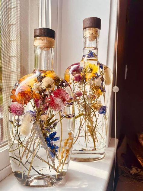 Glass Bottles With Flowers, Clear Bottles With Flowers, Flowers In Liquor Bottles, Flower In Glass Bottle, Wine Bottle With Flowers Inside, Bottle Tattoo, Flower Bottle, Old Glass Bottles, Gift Inspo