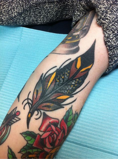 Traditional feather tattoo Traditional Feather Tattoo, Wanted Tattoo, Traditional Tattoo Reference, Tattoo Feather, Traditional Tattoo Inspiration, American Traditional Tattoo Ideas, Traditional Tattoo Ideas, Feather Tattoo Design, Trendy Tattoo