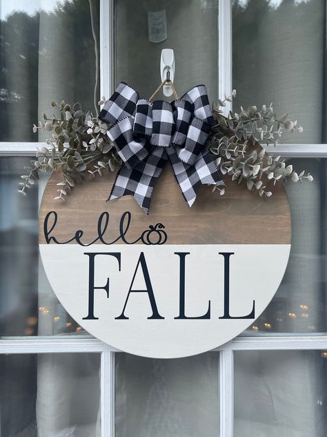 15x15 Hello Fall Welcome sign. Perfect for someone who likes neutral fall decor. Stained with weathered oak and white chalk paint. Permanent black vinyl used with a white and black plaid bow & grey eucalyptus. All Season Welcome Sign, Fall Door Signs Diy, Fall Door Hangers Diy, Fall Welcome Sign Front Door, Fall Door Signs, Fall Cricut Projects, Hello Fall Wood Sign, Fall Welcome Sign, Fall Decor Diy Crafts