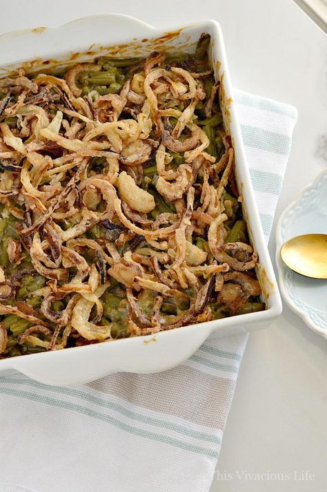 Our gluten-free green bean casserole with homemade fried onions is the perfect accompaniment to your Thanksgiving dinner. It is the best classic Thanksgiving side dish. | gluten free casserole recipes | gluten free side dishes | gluten free vegetable recipes | gluten free thanksgiving recipes | easy gluten free recipes | homemade thanksgiving side dishes || This Vivacious Life #glutenfreesides #greenbeancasserole #thanksgivingsides #thisvivaciouslife Gluten Free Casserole Recipes, Gluten Free Green Bean Casserole, Thanksgiving Casserole Recipes, Gluten Free Casserole, Homemade Green Bean Casserole, Gluten Free Vegetables, Gluten Free Thanksgiving Recipes, Classic Thanksgiving, Easy Thanksgiving Recipes