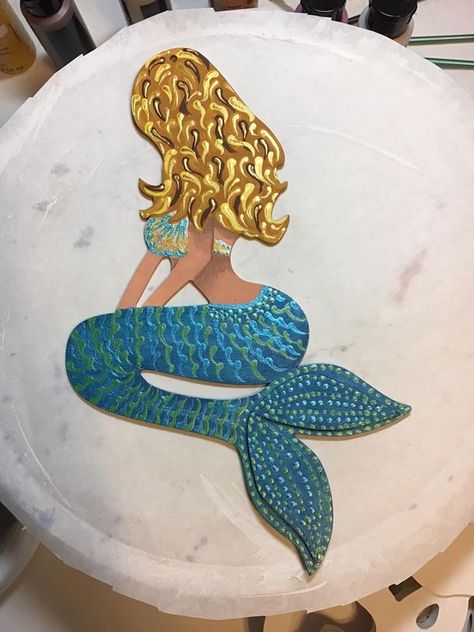 💲Dollar Tree Fanatics Crafts & Decor💲 | DT wooden Mermaid & some DT paint. | Facebook Dollar Tree Mermaid, Mermaid Diy Crafts, Tooth Fairy Pillow Pattern, Wooden Mermaid, Mermaids On Wood, Mermaid Crafts, Beach Bathroom Decor, Mermaid Painting, Mermaid Diy