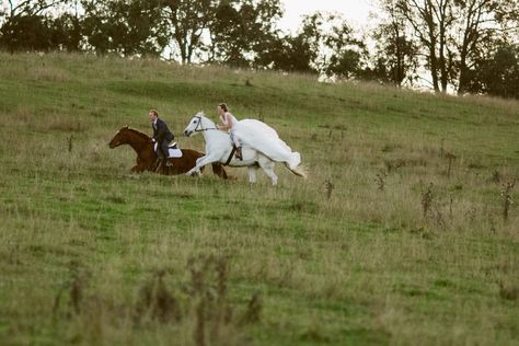 Bride and Groom galloping on Horses.  Gorgeous country wedding location near Sydney, NSW. http://www.chapmanvalleyhorseriding.com/australian-country-horseback-wedding/   White horse. Horseback wedding. Romantic wedding. Outdoor wedding. Unique wedding. Wedding Ideas. Wedding On Horseback, Horse Wedding Photos Beach, White Horse Engagement Photos, Horses Wedding Photography, Wedding Entrance On Horse, Bride Riding Horse, Weddings With Horses, Horse Riding Wedding, Wedding Photos Horses