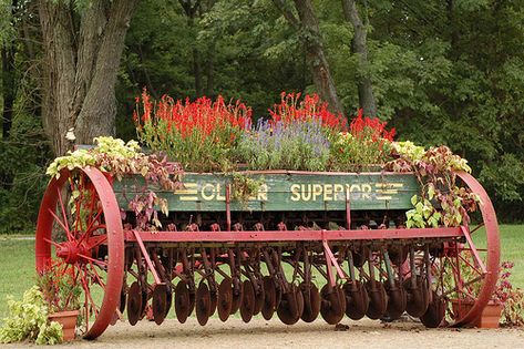 old farm equipment used as flower containers | Recent Photos The Commons Getty Collection Galleries World Map App ... Garden Diy Decoration Ideas, Farm Landscaping, Rusty Garden, Flower Containers, Farmhouse Landscaping, Old Farm Equipment, Vintage Garden Decor, Garden Yard Ideas, Vintage Farm