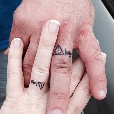 "Always" wedding tattoos for couples. Harry Potter tattoo. Color: Black. Tags: Cool, Couples, Wedding, Twin Bands Tattoo, Matching Couples Tattoos, Ring Tattoo Ideas, Tattoo For Couples, Harry Potter Tattoo Ideas, Wedding Rings Tattoo, Wedding Ring Tattoos, Married Couple Tattoos, Finger Tattoos For Couples