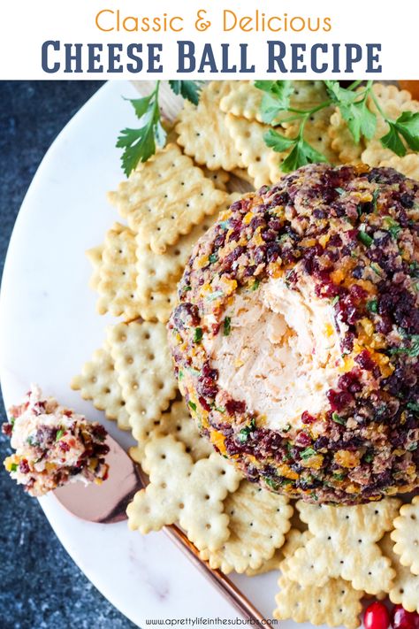 This Classic Cheese Ball is a perfect party appetizer!  This delicious no-nut cheese ball recipe is made with cream cheese, old cheddar and a crust of dried apricots, cranberries, bacon and green onion.  So good. Easy Holiday Party Appetizers, Classic Cheese Ball, Cream Cheese Appetizer, Cream Cheese Ball, Cheese Ball Recipe, Baked Goat Cheese, Nut Cheese, Easy To Make Appetizers, Cranberry Cheese