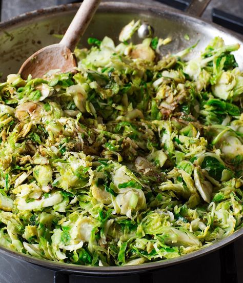 Ina Garten's beginner-level sautéed shredded Brussels sprouts recipe serves four to six and takes less than 10 minutes to make. Ina Garten Brussel Sprouts, Brussel Sprout Shredded Recipes, Shredded Brussel Sprouts Recipes, Ina Garten Vegetable Recipes, Brussels Sprouts Sauteed, Shredded Brussel Sprout Recipes Salad, Brussel Sprout Salad Shredded, Ina Garten Side Dishes, Brussels Sprouts Salad Shredded