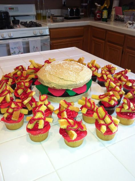 For my oldest son's birthday which always falls on Memorial Weekend-Hamburger cake with peanut butter frosting, brownie patty, and french fry cupcakes with ketchup! Burger Birthday, Hamburger Party, Burger Cupcakes, Mountain Wedding Cake, Cake With Peanut Butter Frosting, Hamburger Cake, Son's Birthday, Small Fry, Memorial Weekend