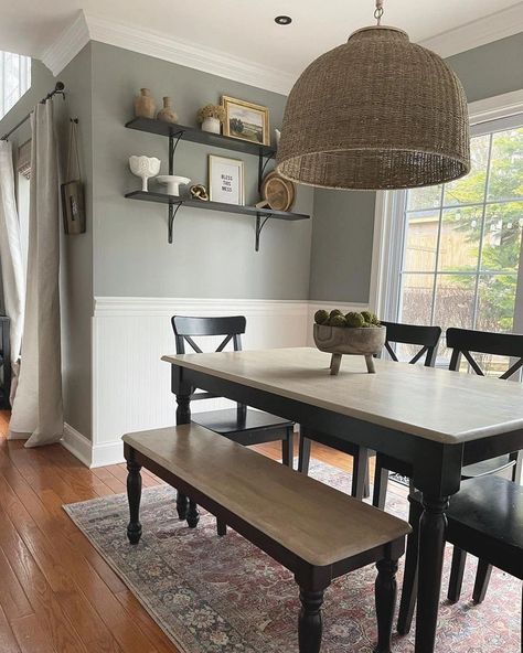 Dining room interior with rattan pendant light, wooden table and black chairs Sherwin Williams Gray Matters, Beadboard Dining Room, Painting Baseboards, Modern Cottage Style, Sherwin Williams Gray, Sherwin Williams Colors, Dining Room Interiors, Gray Matters, Modern Cottage