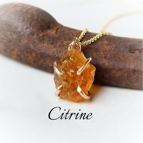 Golden raw natural citrine is set in a handcrafted prong in your choice of 14k gold filled or 925 sterling silver. Suspends from a delicate yet strong 1.1mm sparkling cable chain. ~Natural stones vary in size in color. Stones are approximately 12mm. ~Wrapped in black gift box ~Handmade in Tennessee #JewelryAddict #Fashion #StatementJewelry #Style #JewelryLovers #Jewelry #Accessories #Gemstone #HandmadeJewelry #JewelryDesign Gift Box Handmade, Citrine Necklace, Color Stones, Box Handmade, Natural Citrine, Black Gift Boxes, November Birthstone, Black Gift, Natural Earth