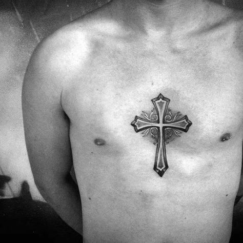 Top 37 Simple Christian Tattoo Ideas [2020 Inspiration Guide] Cross Chest Tattoo, Middle Chest Tattoo, Religious Tattoos For Men, Crucifix Tattoo, Small Cross Tattoos, Tattoo Cross, Meaning Tattoos, Tattoo Chest, Tattoos Simple