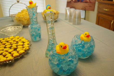 Blue, white, and clear water beads filled jars and other containers for a cute water effect.  A small amount of water beads go along way. Baby Shower Centerpieces For Boys, Rubber Ducky Party, Rubber Ducky Birthday, Rubber Duck Birthday, Ducky Baby Shower, Rubber Ducky Baby Shower, Baby Shower Duck, Duck Birthday, Shower Table