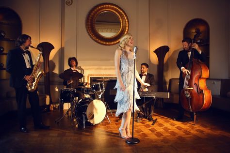 Smooth and sophisticated, you've never heard your favourite songs quite like this. From seamless background music to headlining jazz, swing and Postmodern Jukebox style sets, Chateau Grey are a world-class jazz band with style to spare. Bring the golden age of Hollywood to your event and book them today.  #vintageband #vintageweddingideas #vintagewedding #livemusicians #weddingband #weddingmusic #weddingentertainment #themedparty #vintageparty Reception Entertainment, Drinks Reception, Jazz Songs, Jazz Bar, Live Jazz, Band Outfits, Jazz Club, Jazz Band, Jazz Age