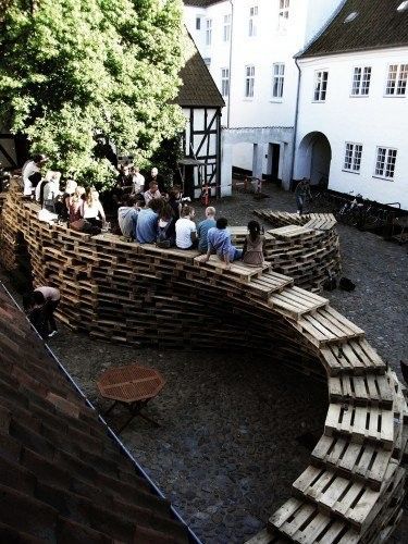 Gallery of Low-Cost Design: Urban Installations and Pavilions Built with Recycled Pallets - 9 Tactical Urbanism, Temporary Architecture, Swiss Cottage, Urban Intervention, Shipping Pallets, Eco Architecture, Recycled Pallet, Recycled Pallets, Urban Furniture