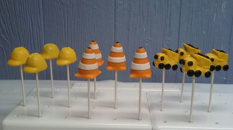 Construction zone cake pops Construction Birthday Cake Pops, Construction Cake Pops, Cake Pops Construction Theme, Sweet Table Construction Truck Party, Vanilla Construction Cake, Construction Theme Cake, Construction Monster Truck Party, Digger Cake, Construction Birthday Cake