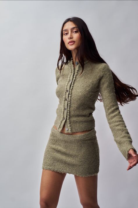 The Palmyra Knit Cardigan is crafted from textured boucle yarn that offers a soft, luxurious feel and a timeless look. Its relaxed fit and classic design make it perfect for layering and pairs back to the Palmyra Knit Mini Skirt. Fabrication: Brushed Boucle Sonali is wearing a size S and is 5'10" with a 31" bust, 35" hips, and 23" waist Cute Professional Outfits, Knit Mini Skirt, Boucle Knit, Perfect White Tee, Fasion Outfits, Cargo Skirt, Winter Trends, Solid & Striped, Feminine Outfit