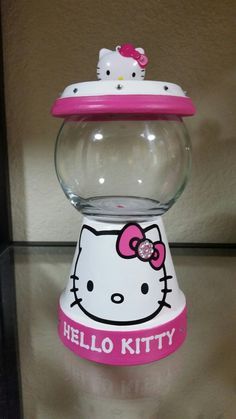 Terra Cotta Pot Gumball Machine, Hello Kitty Diy Crafts, Hello Kitty Gumball Machine, Hello Kitty Diy, Diy Terra Cotta Pots, Diy Hello Kitty, Terra Cotta Pot Crafts Diy, Bubble Gum Machine, Clay Pot Projects