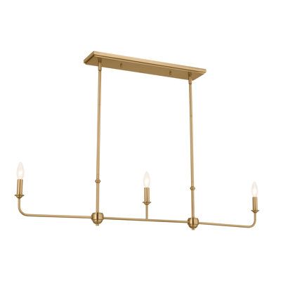 A refined take on a classic, this linear chandelier is delicate with a hint of opulence. Its linen shades give you ambient illumination while removing them lets you enjoy a classic candelabra. Enjoy customizing it to suit your space. Sloped ceiling compatible, its hanging height can be adjusted with its included stems and chains | 3 -Light Kitchen Island Pendant Light in Gold Color White by Gerad Rosdorf Park, Metal | C009569245_1042873548 | Wayfair Canada Linear Light Over Island, Linear Chandelier Over Island, Farmhouse Table Lighting, Chandelier Over Island, Linear Chandelier Dining Room, Brass Kitchen Lighting, Birmingham House, Cascade Chandelier, Linear Kitchen Island Lighting