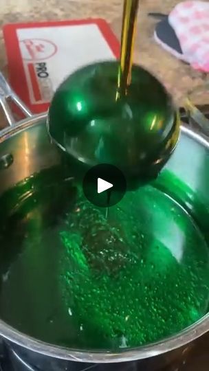 781K views · 48K reactions | Making METALLIC CANDY APPLES with my Grandbaby! | Making METALLIC APPLES with my grandbaby! I used a 4-1-1 recipe. 4 cups sugar, 1 cup water and 1 cup Karo syrup and 1-1/2 tbs of food coloring... | By REAL LIFE with Al and Chelle | Now y'all know every time my grandbaby comes over she expects us to do something together. So I used to make red candyapples all the time. But I surprised her today. Look at my baby. Just waiting patiently. She has no idea what we're going to do. Now I didn't want her to suspect anything. So I started with the red first. And she was like oh Mimi that's pretty. But then she thought we were done. And I said no no no. Let's make some more color She was like ooh. So when I pulled out that green she was amazed. She was like oh Mimi it's Metallic Candy Apples, Candy Apple Bar Ideas, How To Make Candy Apples, Green Candy Apples, Wedding Candy Apples, Purple Candy Table, Toffee Apples Recipe, Candy Apples Diy, Colored Candy Apples