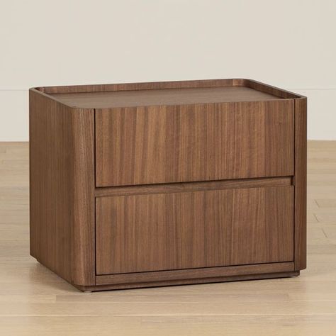 Our Nomad collection is comprised of many versatile options, including a nightstand that elevates your bedroom with contemporary appeal. Smooth walnut veneers feature a rich mid-tone finish with noticeable grain—plus, rounded corners add presence to your sanctuary. Two drawers provide quick access to bedside essentials. The recessed top is perfect for placing home decor, like a picture frame or a lamp. Walnut Nightstand Bedroom, Nightstands Ideas Bedside Tables, Wide Bedside Table, Walnut Bedside Table, Bedside Essentials, Walnut Nightstand, Night Stands, 2 Drawer Nightstand, Night Table