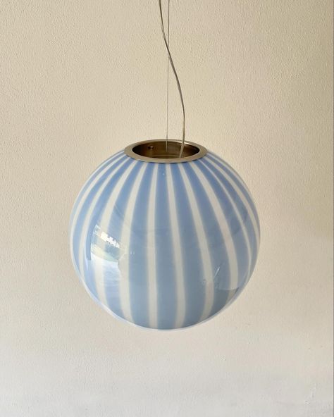 Our exclusive Murano lamp: BLUE PERVINCA “FILIGRANA STRIPES LAMPS”. Lamps handmade by Murano glass masters in the ancient technique of working with colored glass canes. This in beautiful blue pervinca color, In diameter 40 cm, sphere shape. The lamp is available also in diameter 30 cm, for ceiling or for table. The frame are available in golden or silver satined finish. Please contact us for information and prices. we ship worldwide 🌎 #filigranastripes #muranoceilinglamp #filigranalamp... Murano Table Lamp, Lamps Handmade, Murano Lamp, Lamp Blue, The Frame, Design Store, Murano Glass, Beautiful Blue, Ceiling Lamp