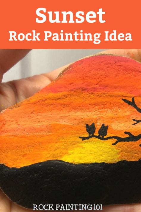 Sunset painted onto a rock with birds on a tree silhouetted in the foreground. Text reads "Sunset Rock Painting Idea" Sunset Rock Painting Easy, Sunset Rock Painting, Paint Blending, Rock Painting Idea, Simple Paint, Painting 101, Moon Rocks, Rock Painting Tutorial, Painted Rocks Craft