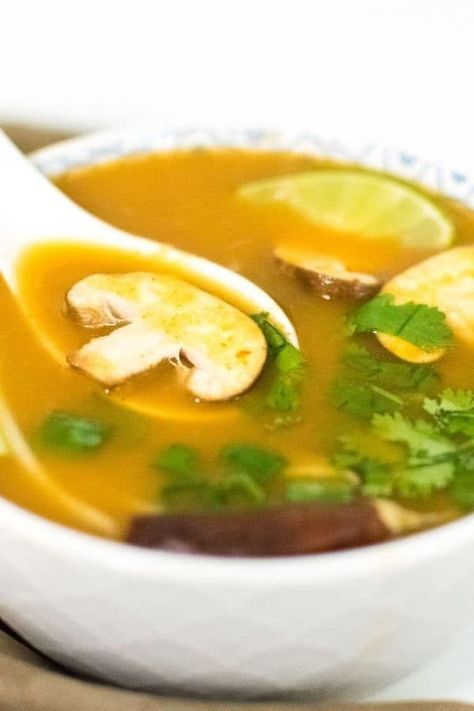 This Instant Pot Tom Yum Soup Recipe is delectably spicy, tangy and salty. It is vegan, gluten free, oil free and made with simple ingredients. It’s a one pot, easy and warm bowl of deliciousness that can be enjoyed all year round. It has a nice authentic and comforting Thai flavor | kiipfit.com Tom Yum Soup Instant Pot, Tom Yum Soup Recipe Vegetarian, Tom Yum Soup Recipe Using Paste, Tom Yum Vegan Soup, Vegan Tom Yum, Vegan Tom Yum Soup, Vegan Tom Kha Gai Soup, Tom Yum Soup Recipe, Indian Comfort Food