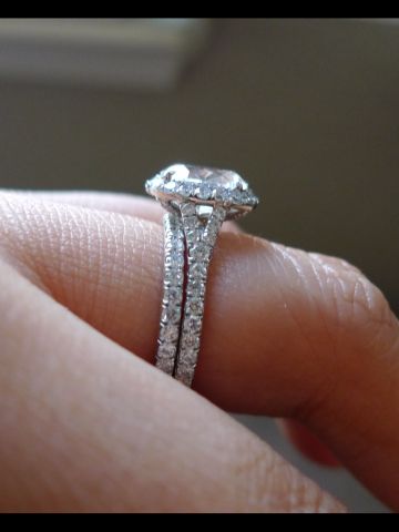 low set halo - love, except for where the band splits under the center stone. Much prefer the single, micro-pave all the way around. Low Profile Engagement Rings, Lovisa Jewellery, Oval Halo Engagement Ring, Round Halo Engagement Rings, London Ontario, Round Halo, Engagement Rings Oval, Halo Engagement Rings, Halo Engagement Ring