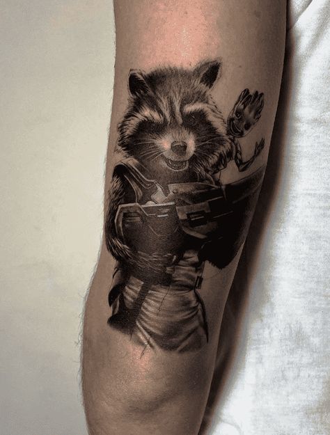 Rocket Raccoon Tattoo Design Images (Rocket Raccoon Ink Design Ideas) Rocket The Raccoon Tattoo, Groot Rocket Tattoo, Marvel Rocket Tattoo, Guardians Of The Galaxy Rocket Tattoo, Rocket Guardians Of The Galaxy Tattoo, Guardians Of The Galaxy Tattoo Ideas, Groot And Rocket Tattoo, Rocket Tattoo Guardians Of The Galaxy, Rocket Racoon Tattoo