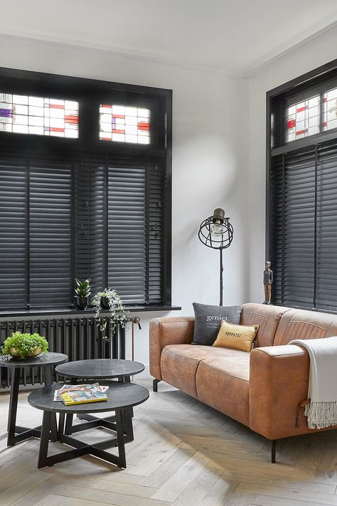 Black Blinds Living Room, Black Wood Blinds, Black Wood Window Blinds, Modern Blinds Living Rooms, Black Wooden Blinds Living Room, Black Horizontal Blinds, Black Venitian Blinds Living Room, Distressed Leather Couch, Black Blinds