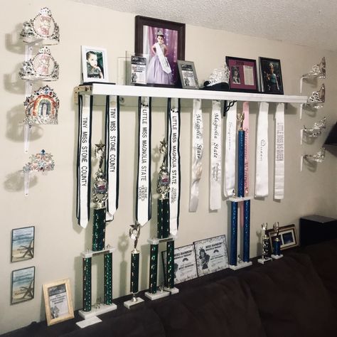 Pageant Crown and Sash Display using shelf brackets Pageant Crown And Sash Display, Pageant Sash Display, Crown And Sash Display, Dance Awards Display Ideas, Crown Display Ideas, Pageant Room, Pageant Crown Display Ideas, Trophy Display Ideas, Jackie Sullivan