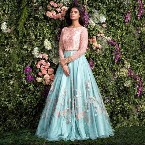 A flowy pastel turquoise & dusty pink tulle gown with coloured resham embroidery on the panels & tonal sparkle embellishment on the bodice.… Outfit For Reception Indian, Dresses For Groom Sister, Groom Sister Dress Indian Outfit, Outfit For Reception, Groom Sister, Navratri Lehenga, Dress Pakistani, Designer Bridal Lehenga Choli, Wedding Lehengas