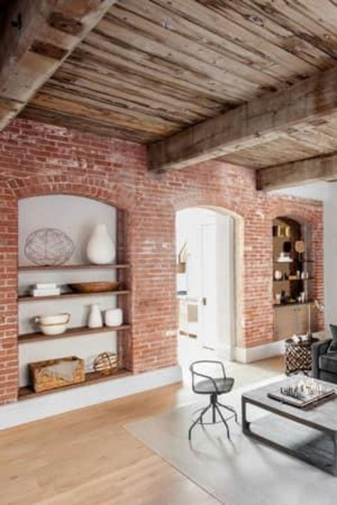 Red Brick Living Room, Red Brick Interior, Shelves On Wall, Mute Colors, Brick Fireplace Decor, Light Wood Flooring, Small House Extensions, Brick Wall Living Room, Brick Living Room