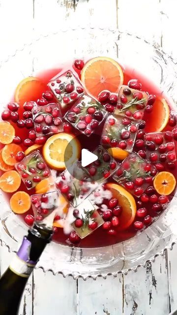 Lexi Harrison & Beth Sinclair on Instagram: "This holiday punch with Dole pineapple, cranberry juice, rum and ginger beer is the ultimate large-batch cocktail to make if you’re hosting this weekend! #ad | @DoleSunshine pineapple canned in 100% juice is the perfect way to add sweetness to your punch, especially with some extra festive pineapple, cranberry & rosemary ice cubes to keep your punch from getting watered down! This recipe really couldn’t be any easier to make and it’s a definite crowd pleaser. Give it a try (recipe below)! #DoleOneCanRecipe
 

Ingredients:

 

2 cans Dole Pineapple Tidbits in 100% Pineapple Juice

64 oz cranberry juice

24 oz ginger beer

2 cups rum (1 cup white rum, 1 cup dark rum)

1 bottle sparkling wine

Orange slices, cranberries, etc for garnish

For ice cu Rosemary Ice Cubes, Pineapple Tidbits, Pure Cranberry Juice, Dole Pineapple, Batch Cocktails, Holiday Punch, Christmas Recipes Appetizers, Boozy Drinks, White Rum