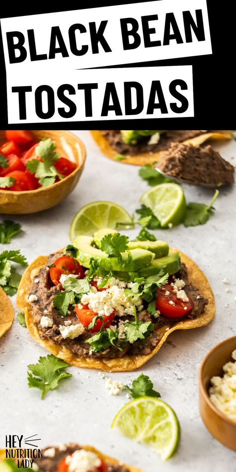 These quick and easy Black Bean Tostadas are made with oven-crisped tortillas, refried black beans, and all of your favourite toppings. Simple to make and endlessly customizable, these vegetarian tostadas are a family favorite. Black Bean Tostada, Vegetarian Tostadas, Bean Tostada, Black Bean Tostadas, Bean Tostadas, Refried Black Beans, Vegetarian Mexican Recipes, Tostada Recipes, Homemade Refried Beans