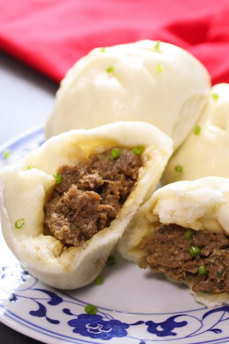 steamed pork buns are classic Chinese food that is perfect as a snack or part of a meal Siopao Recipe, Steam Buns Recipe, Steam Buns, Moo Shu, Chinese Appetizers, Steamed Pork Buns, Meat Bun, Steamed Pork, Cooking Chinese Food